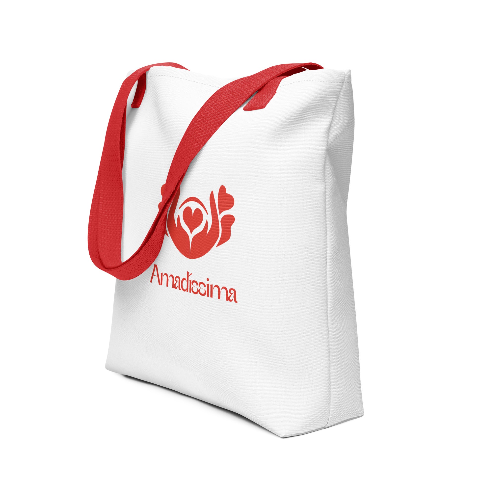 Detalle del logo rojo en bolsa tote blanca “Esencial”