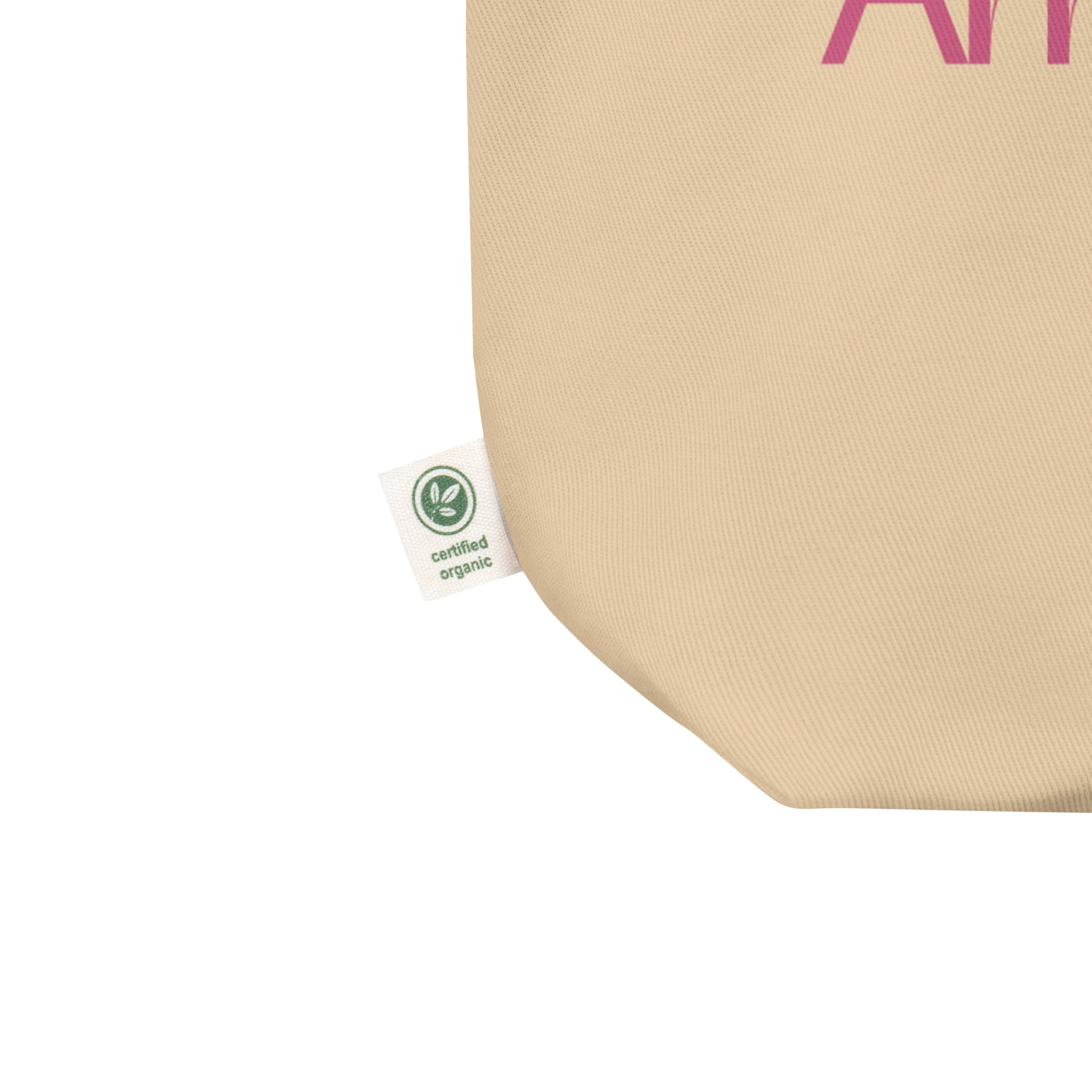 Detalle del logo fucsia en bolsa tote oyster “Sutil” algodón orgánico