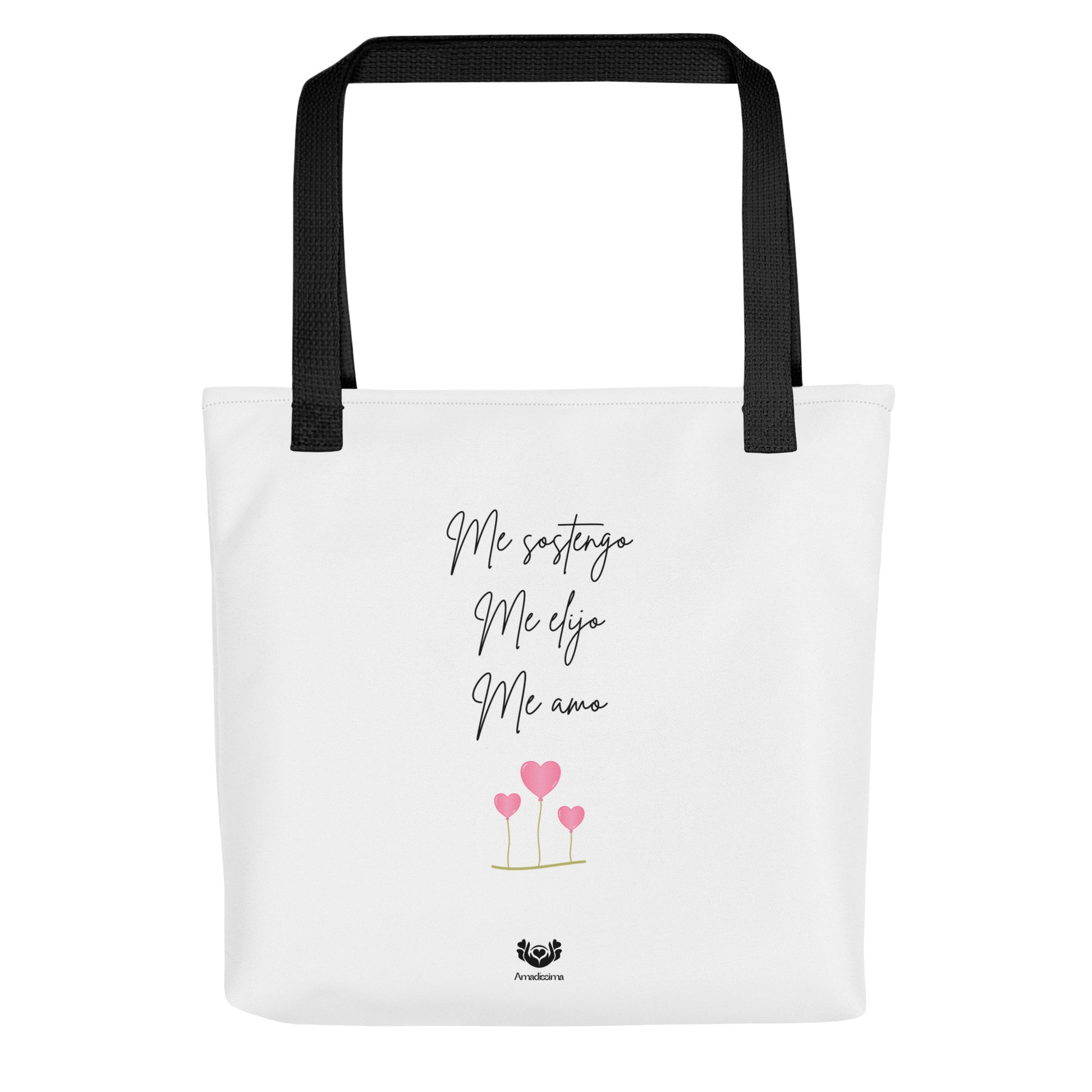 Bolsa tote blanca con asas negras Amadíssima, vista frontal con frase “Me sostengo, me elijo, me amo”, diseño consciente y sostenible.