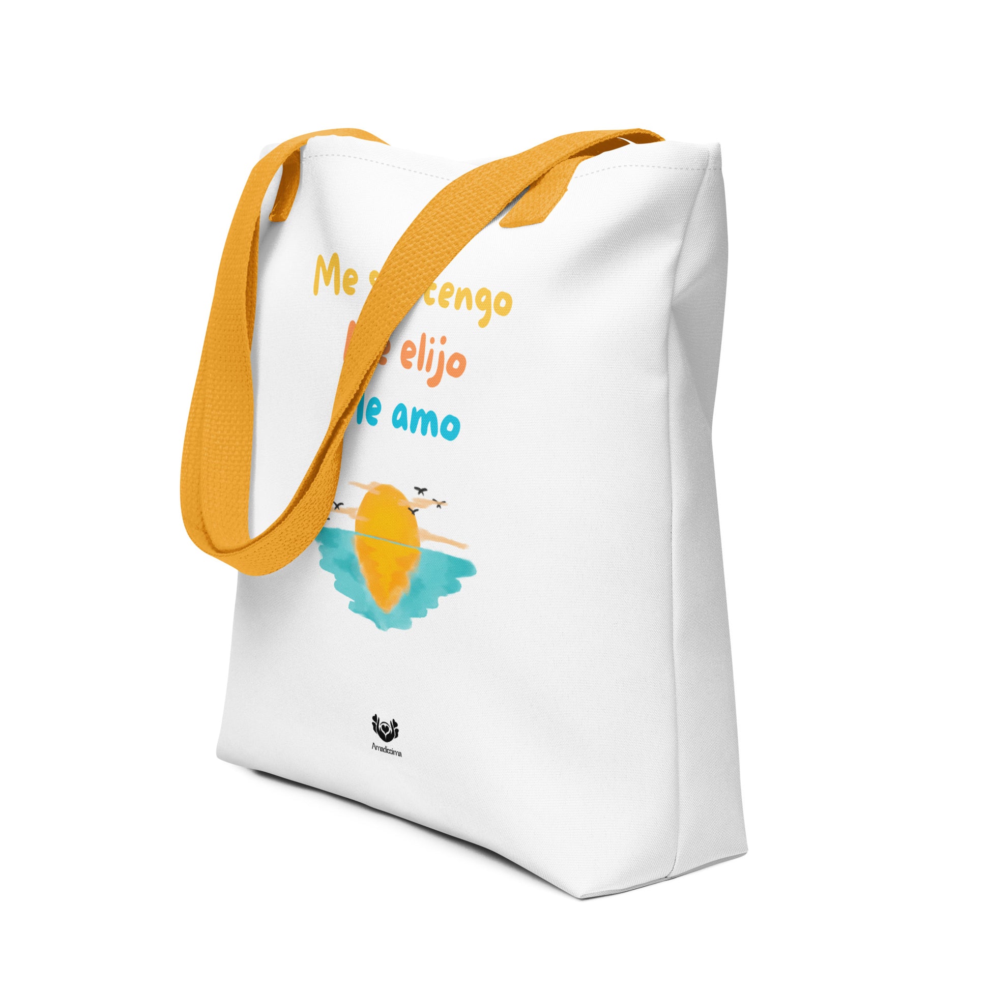 Vista de perfil de la bolsa tote con asas amarillas y mensaje positivo